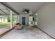 Spacious carport featuring a ceiling fan, comfortable seating, and convenient access to the home at 5002 Kendridge Dr, Durham, NC 27712