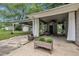 Outdoor living area featuring a ceiling fan, comfortable seating, and plenty of natural light at 5002 Kendridge Dr, Durham, NC 27712