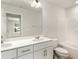 The clean bathroom features a double sink vanity, toilet, and a shower and tub combo at 501 Hazy Hills Ln, Garner, NC 27529