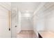 Spacious walk-in closet with shelving on all sides for maximum storage at 501 Hazy Hills Ln, Garner, NC 27529
