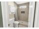 Well-lit bathroom featuring a modern shower and storage cabinet at 507 S Mebane St, Burlington, NC 27215