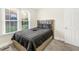 Bright bedroom with a large window, providing natural light and pleasant views at 507 S Mebane St, Burlington, NC 27215