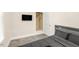 Cozy bedroom features a television and closet for ample storage solutions at 507 S Mebane St, Burlington, NC 27215