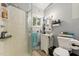 Cozy bathroom features a glass shower, mirror, and a toilet at 5932 Johnson Pond Rd, Fuquay Varina, NC 27526