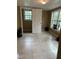 Bright room with tile floor featuring windows and a neutral color scheme at 5932 Johnson Pond Rd, Fuquay Varina, NC 27526