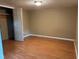 This room features wood floors and a neutral wall color at 5932 Johnson Pond Rd, Fuquay Varina, NC 27526