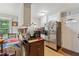 Bright kitchen features stainless steel appliances, a breakfast area, granite countertops, and ample cabinet space at 5932 Johnson Pond Rd, Fuquay Varina, NC 27526