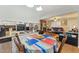 Open concept kitchen flows into the living area, perfect for entertaining or relaxing at 5932 Johnson Pond Rd, Fuquay Varina, NC 27526