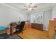 Office space with hardwood floors, desk, drawers and a ceiling fan at 5932 Johnson Pond Rd, Fuquay Varina, NC 27526