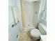 Bathroom featuring a shower stall, patterned floor, toilet, and towel bar at 609 Malone Ct, Burlington, NC 27215