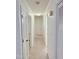 Bright hallway with carpet flooring and multiple doorways at 609 Malone Ct, Burlington, NC 27215