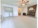 View of the open living room with fireplace and washer/dryer hookups in closet at 609 Malone Ct, Burlington, NC 27215