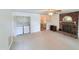 Open living area with fireplace and washer/dryer closet for convenience at 609 Malone Ct, Burlington, NC 27215