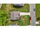 Aerial view showcasing the home's location, roof, driveway, and expansive yard at 635 Black Angus Dr, Haw River, NC 27258