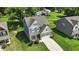 Aerial view of a house featuring blue siding and a well-manicured front lawn at 635 Black Angus Dr, Haw River, NC 27258
