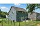 Backyard featuring a well-manicured lawn and a house with blue siding at 635 Black Angus Dr, Haw River, NC 27258