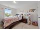 Charming bedroom featuring hardwood floors, a round rug, and natural light at 635 Black Angus Dr, Haw River, NC 27258
