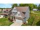 Beautiful two-story home with stone accents, two-car garage, and well-maintained landscaping at 635 Black Angus Dr, Haw River, NC 27258