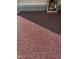 Spacious garage with a red, white, and black speckled epoxy floor coating at 635 Black Angus Dr, Haw River, NC 27258