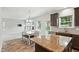 Open concept kitchen and dining area with stainless steel appliances and granite countertops at 635 Black Angus Dr, Haw River, NC 27258