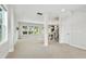 Bright living room with neutral carpet and paint, and an open layout at 635 Black Angus Dr, Haw River, NC 27258