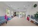 Spacious living area with carpet, neutral paint, and ample natural light at 635 Black Angus Dr, Haw River, NC 27258