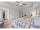 Comfortable main bedroom with a walk-in closet and carpeted floors at 635 Black Angus Dr, Haw River, NC 27258