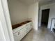 Spacious bathroom features new cabinets and modern design in new construction home at 682 Old Station Pointe, Angier, NC 27501