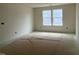 Bedroom with neutral walls, natural light, creating a bright and airy space ready to personalize at 682 Old Station Pointe, Angier, NC 27501