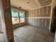 Bright bedroom featuring two windows, ready for customization and personal touches at 682 Old Station Pointe, Angier, NC 27501
