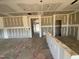 Open living space with visible infrastructure, and potential for a modern design at 682 Old Station Pointe, Angier, NC 27501