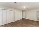 Bedroom featuring a large closet, hardwood floors, and neutral paint at 6824 Branton Dr, Cary, NC 27519