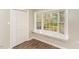 Bedroom featuring a window seat, a closet, and hardwood floors at 6824 Branton Dr, Cary, NC 27519