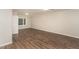 Large bedroom features a window, new floors, and neutral paint at 6824 Branton Dr, Cary, NC 27519