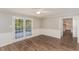 Cozy dining area with french doors leading to the deck and hardwood floors at 6824 Branton Dr, Cary, NC 27519