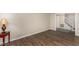 Living room with hardwood floors and view of staircase at 6824 Branton Dr, Cary, NC 27519