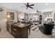 Open-concept bar area adjacent to the living room, ideal for entertaining, offering premium drinks and a relaxed atmosphere at 8308 Society Pl, Raleigh, NC 27615