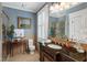 Well-lit bathroom featuring a marble vanity, decorative accents, and tiled flooring at 8308 Society Pl, Raleigh, NC 27615
