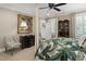 Comfortable bedroom featuring a unique four-poster bed, elegant decor, and plantation shutters at 8308 Society Pl, Raleigh, NC 27615