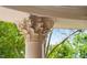 Ornate architectural details on a white exterior column with decorative trim and landscaping at 8308 Society Pl, Raleigh, NC 27615