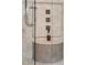 This custom shower has a built-in bench and adjustable spray heads at 8308 Society Pl, Raleigh, NC 27615