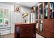 This walk-in closet has custom cabinets and shelving for plenty of storage at 8308 Society Pl, Raleigh, NC 27615
