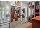 This walk-in closet has custom cabinets and a mirrored door at 8308 Society Pl, Raleigh, NC 27615