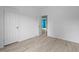 Bright bedroom featuring light wood-look floors and a closet at 921 Sweet Raspberry Lane Ln, Lillington, NC 27546