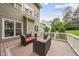 Inviting outdoor deck with cozy seating, perfect for relaxing and entertaining at 925 Hidden Jewel Ln, Wake Forest, NC 27587