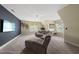 Spacious bonus room offering a comfortable lounge area and entertainment space at 925 Hidden Jewel Ln, Wake Forest, NC 27587