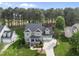 Beautiful two-story home with manicured lawn, mature trees, and an attached two-car garage at 925 Hidden Jewel Ln, Wake Forest, NC 27587
