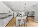 Spacious kitchen with a large island, barstool seating, and stainless steel appliances at 925 Hidden Jewel Ln, Wake Forest, NC 27587