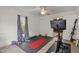 Home gym with exercise equipment and ceiling fan at 925 S Chestnut St, Henderson, NC 27536