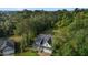 An aerial view of the beautiful house surrounded by lush green trees and manicured lawns at 96 Linda Lou Ln, Angier, NC 27501